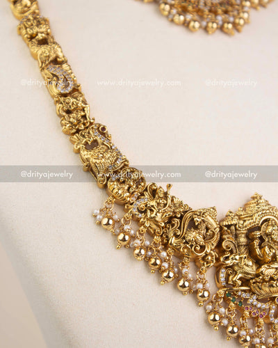 Beautiful nakshi chain with deity carvings and CZ detailing