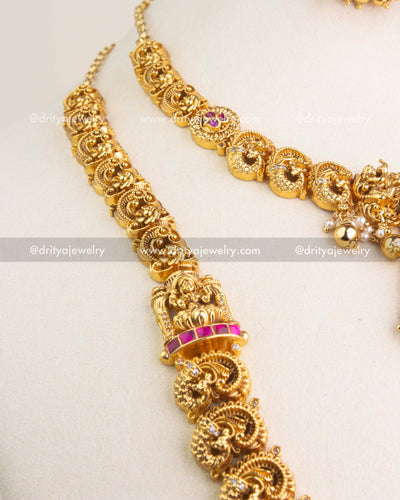 Temple jewelry combo set featuring long and short necklaces with Lakshmi motifs, kemp stones, and antique gold finish.