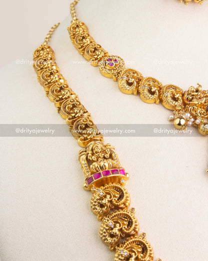 Temple jewelry combo set featuring long and short necklaces with Lakshmi motifs, kemp stones, and antique gold finish.