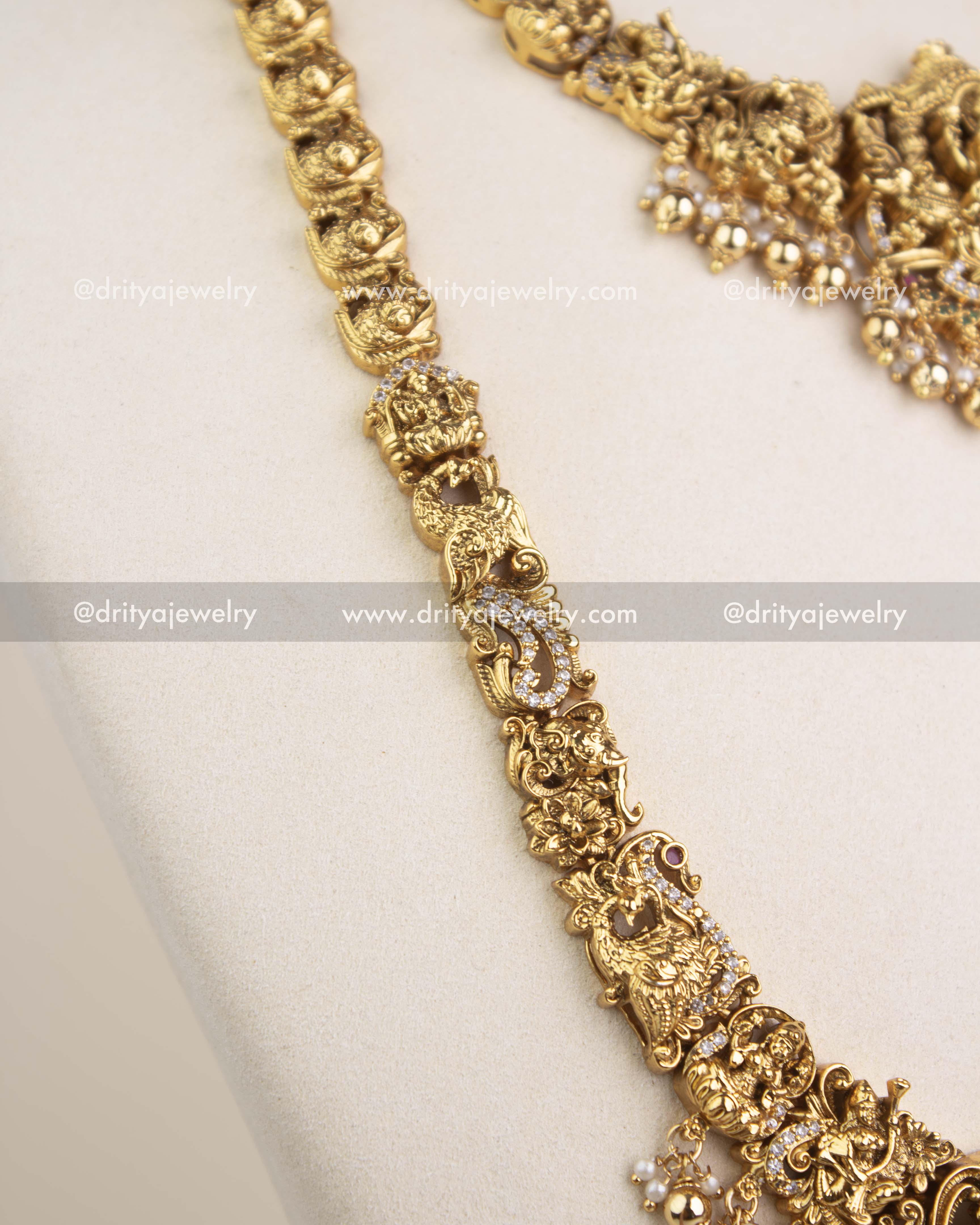Beautiful nakshi chain with deity carvings and CZ detailing
