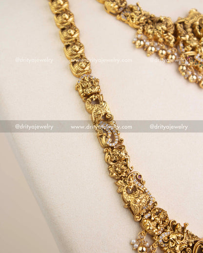 Beautiful nakshi chain with deity carvings and CZ detailing