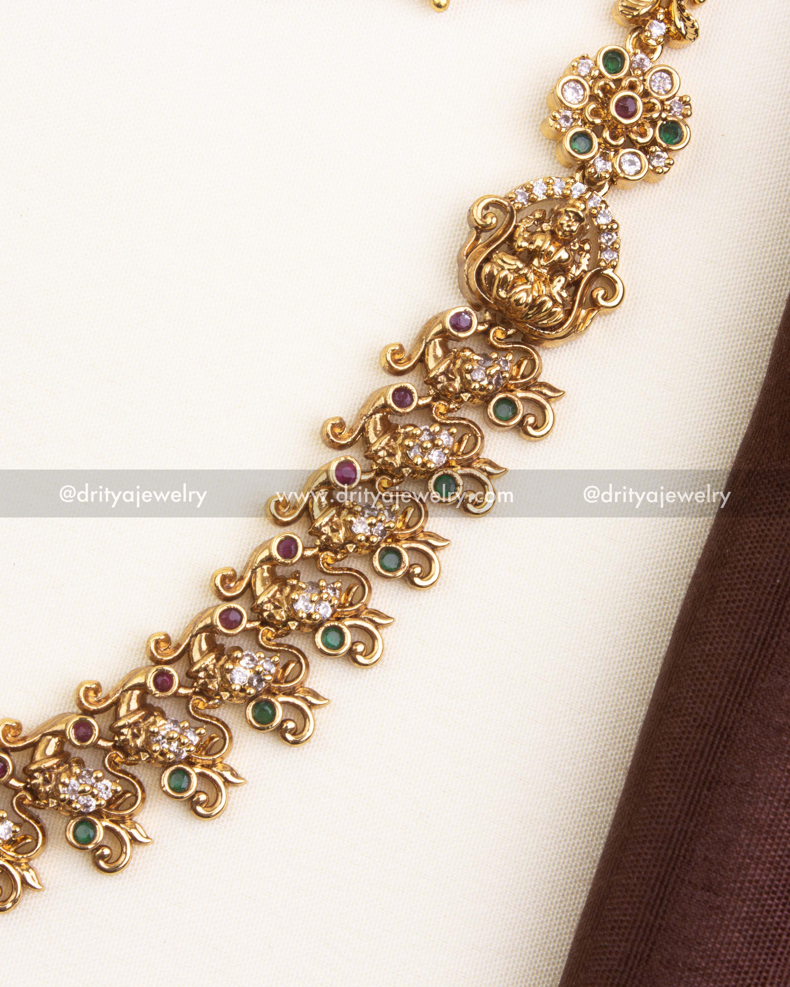 Detailed Nakshi chain links with ruby and emerald accents in temple short necklace