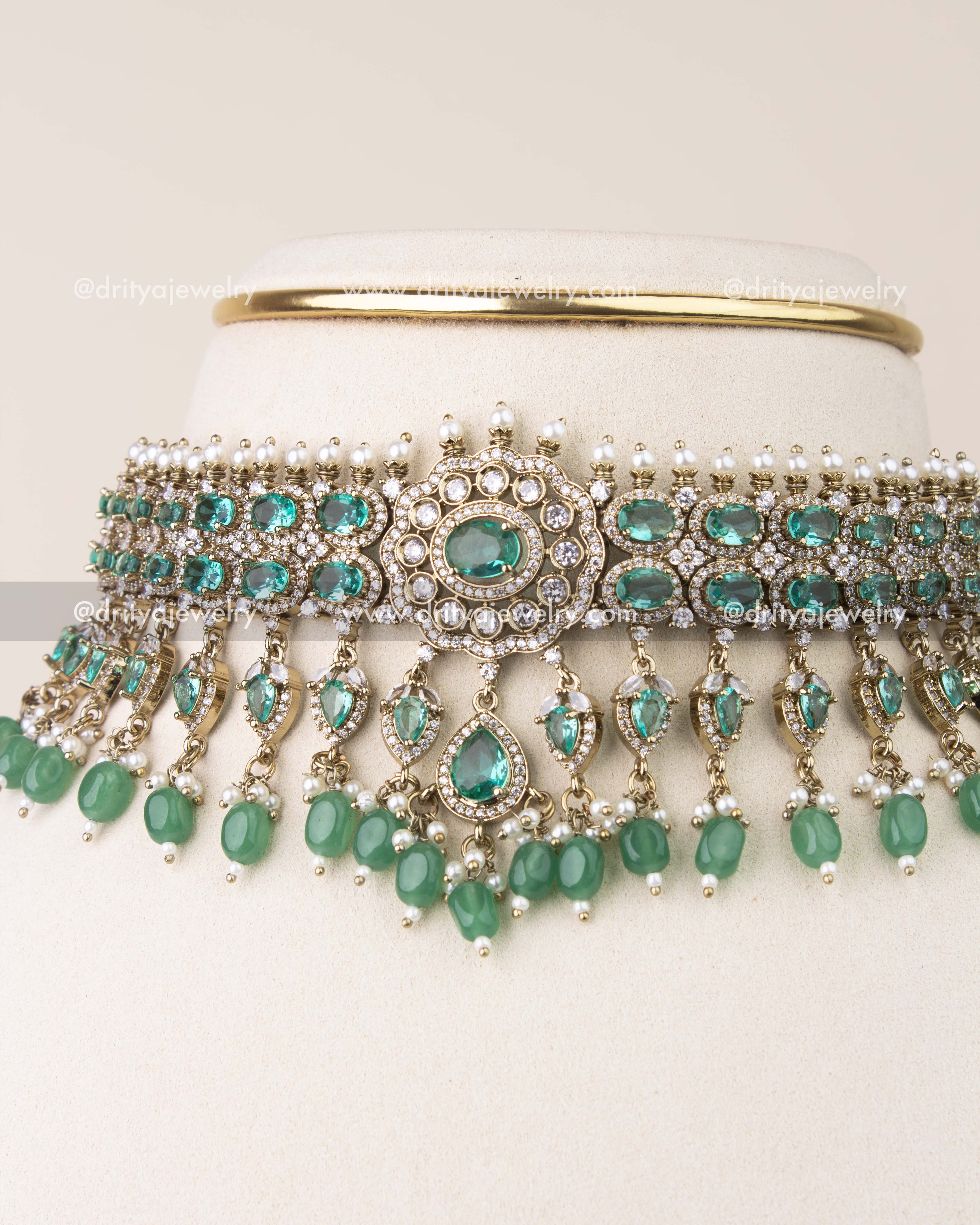 Close-up of Russian emerald stones and crystal setting in antique Victorian choker