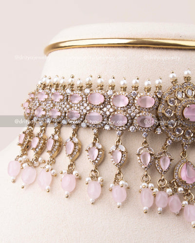 Close-up of blush pink stone Victorian choker featuring crystal detailing and pearl hangings