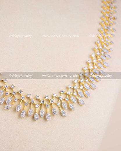 Detailed view of cascading leaf motifs with shimmering diamond-replica stones.