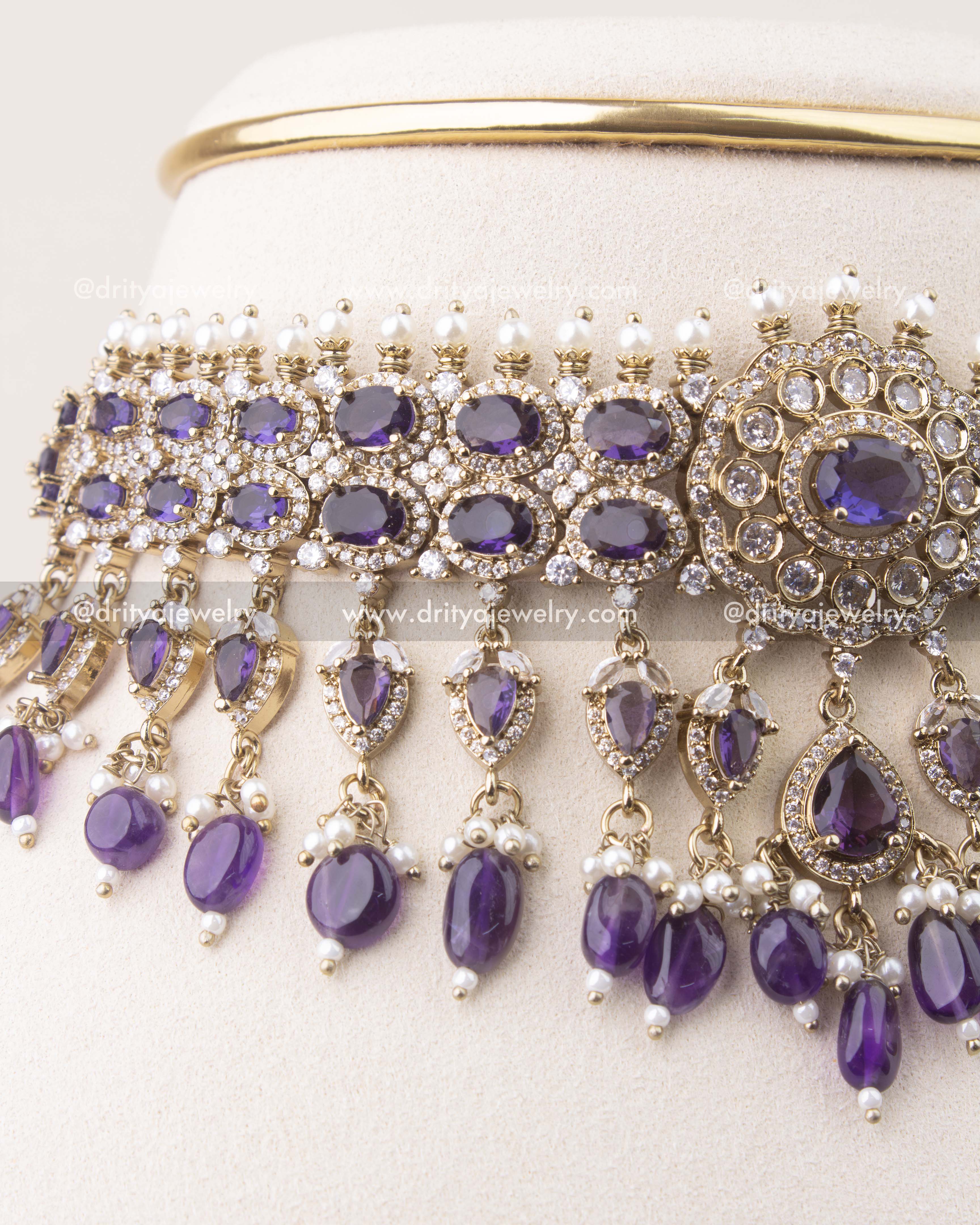 Close-up of Victorian choker featuring deep purple stones, crystal detailing, and pearl hangings