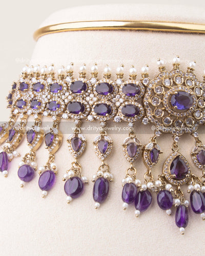 Close-up of Victorian choker featuring deep purple stones, crystal detailing, and pearl hangings