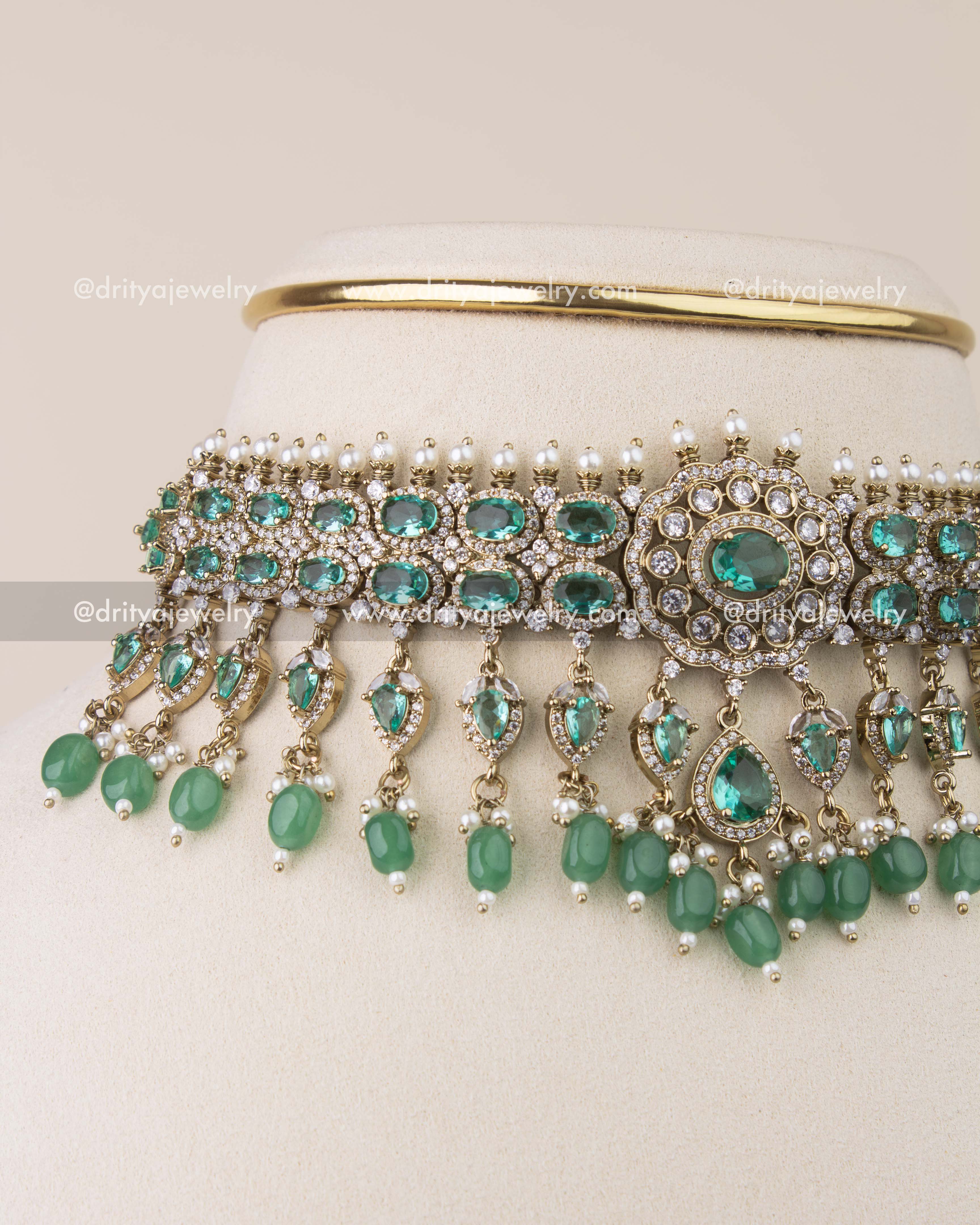 Close-up of Russian emerald stones and crystal setting in antique Victorian choker