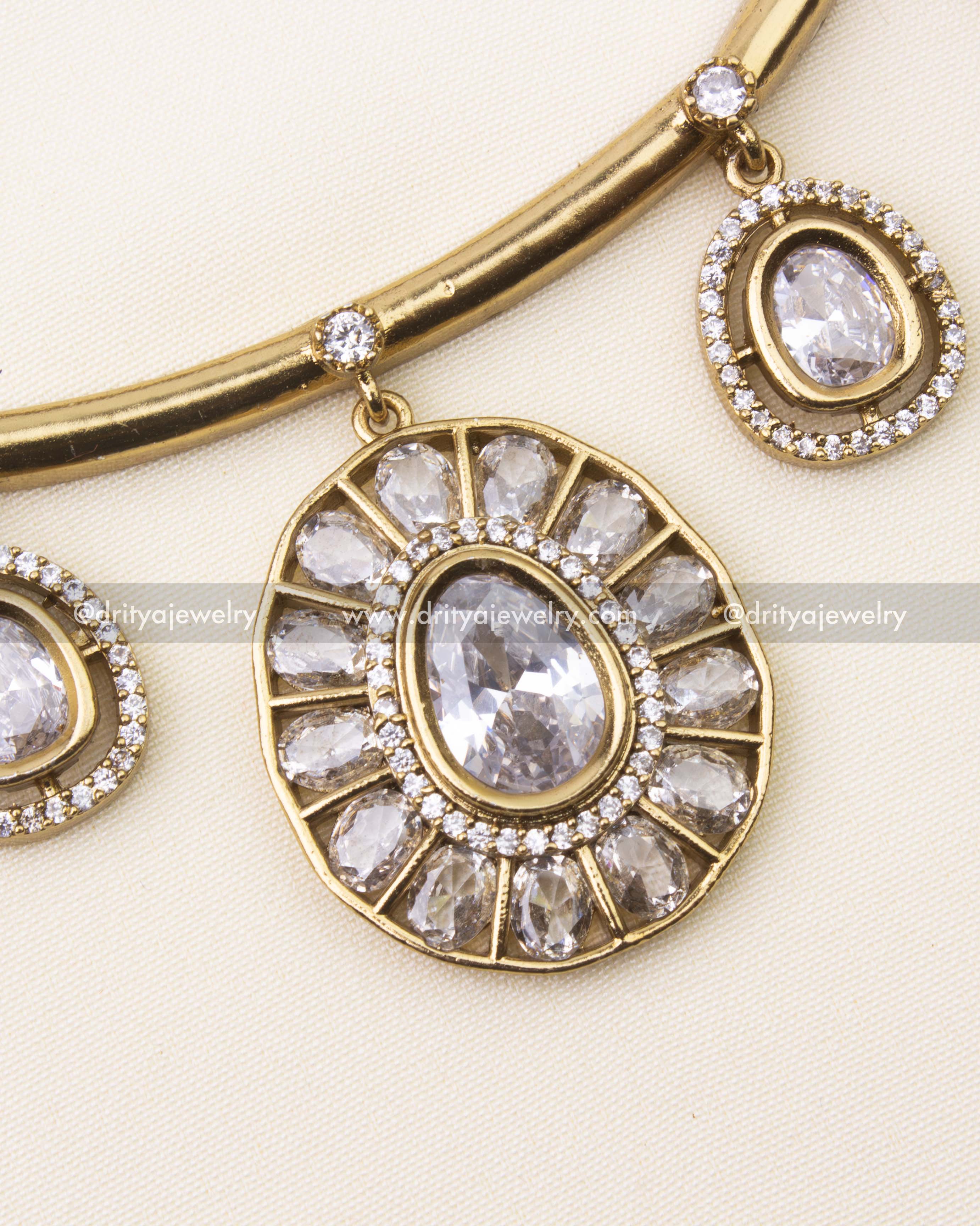 Close-up of white center stone pendant on Hasli necklace