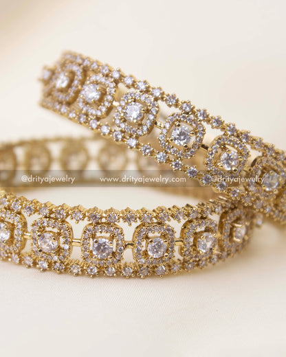 Close-up of Victorian polish bangles featuring diamond-alike stones