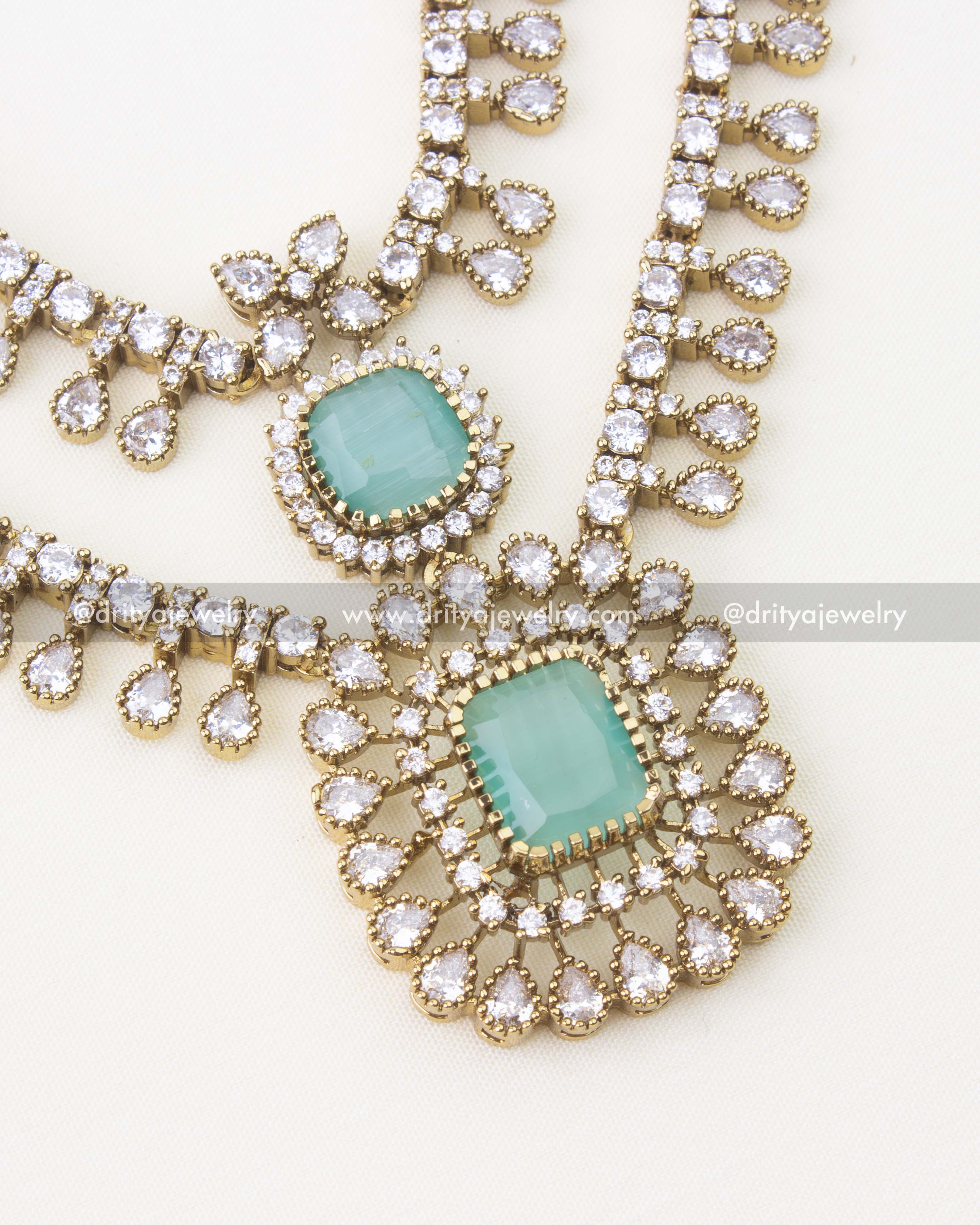 Gold finish Victorian necklace featuring mint green stone and CZ embellishments