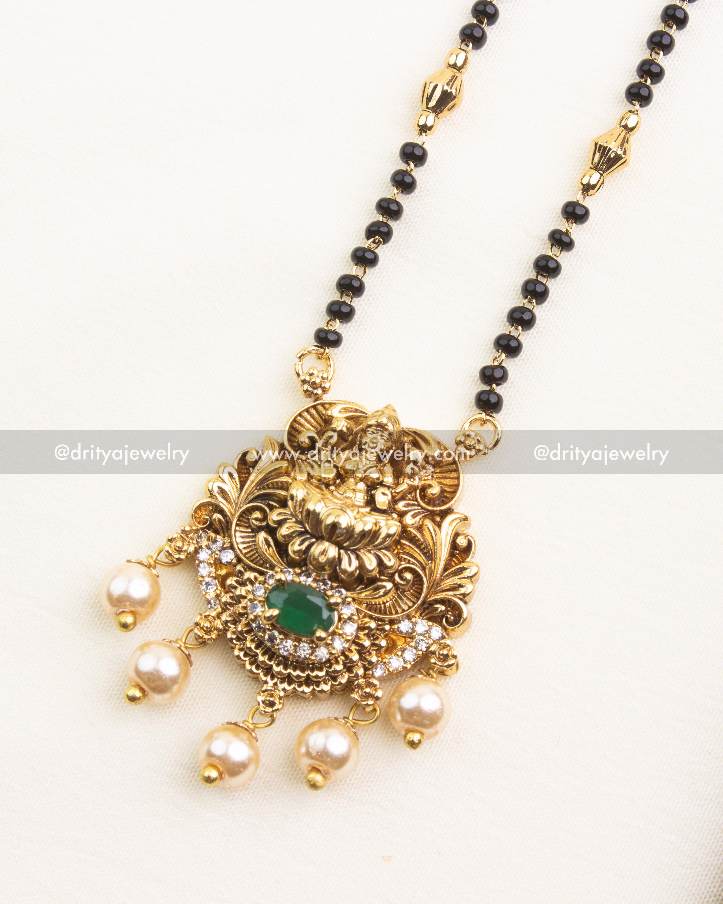 Lakshmi Pendant with Green Stone and Pearl Danglers – Black Beads Temple Necklace