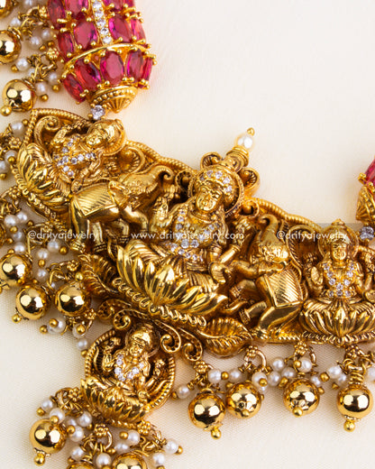 Temple motifs with ruby stones and elephant detailing