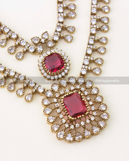Victorian gold plated necklace with ruby red stone and CZ halo design