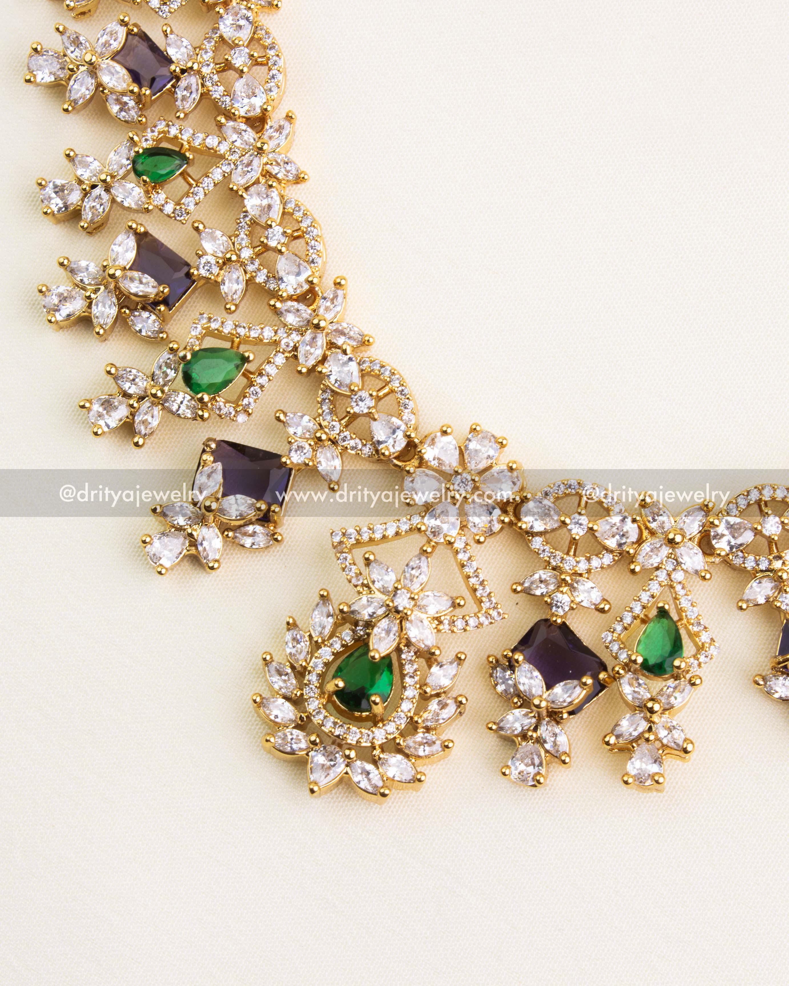 Close-Up Detailing of CZ Necklace with Purple & Green Stones
