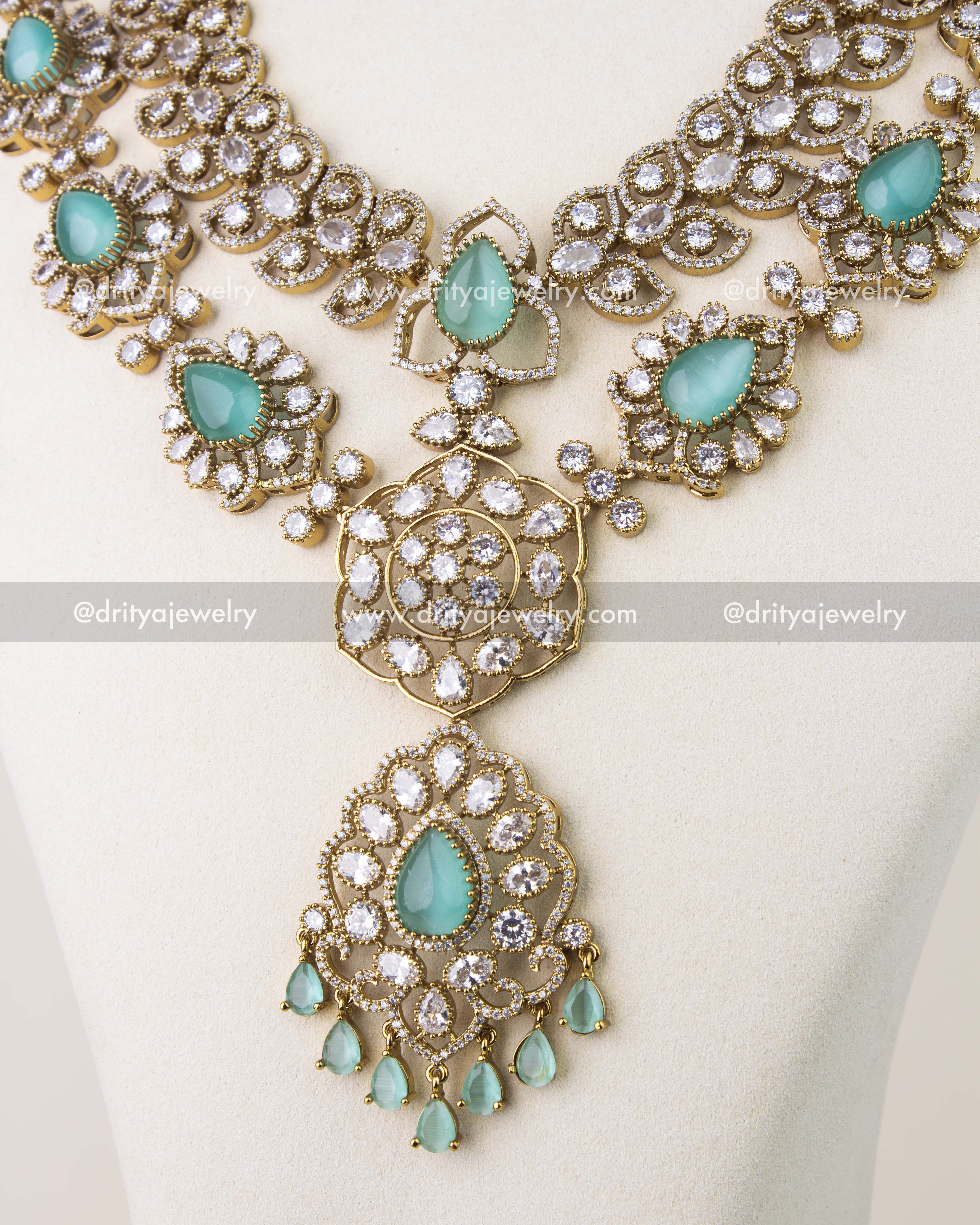 Mint cushion stone pendant with CZ detailing in Victorian gold finish