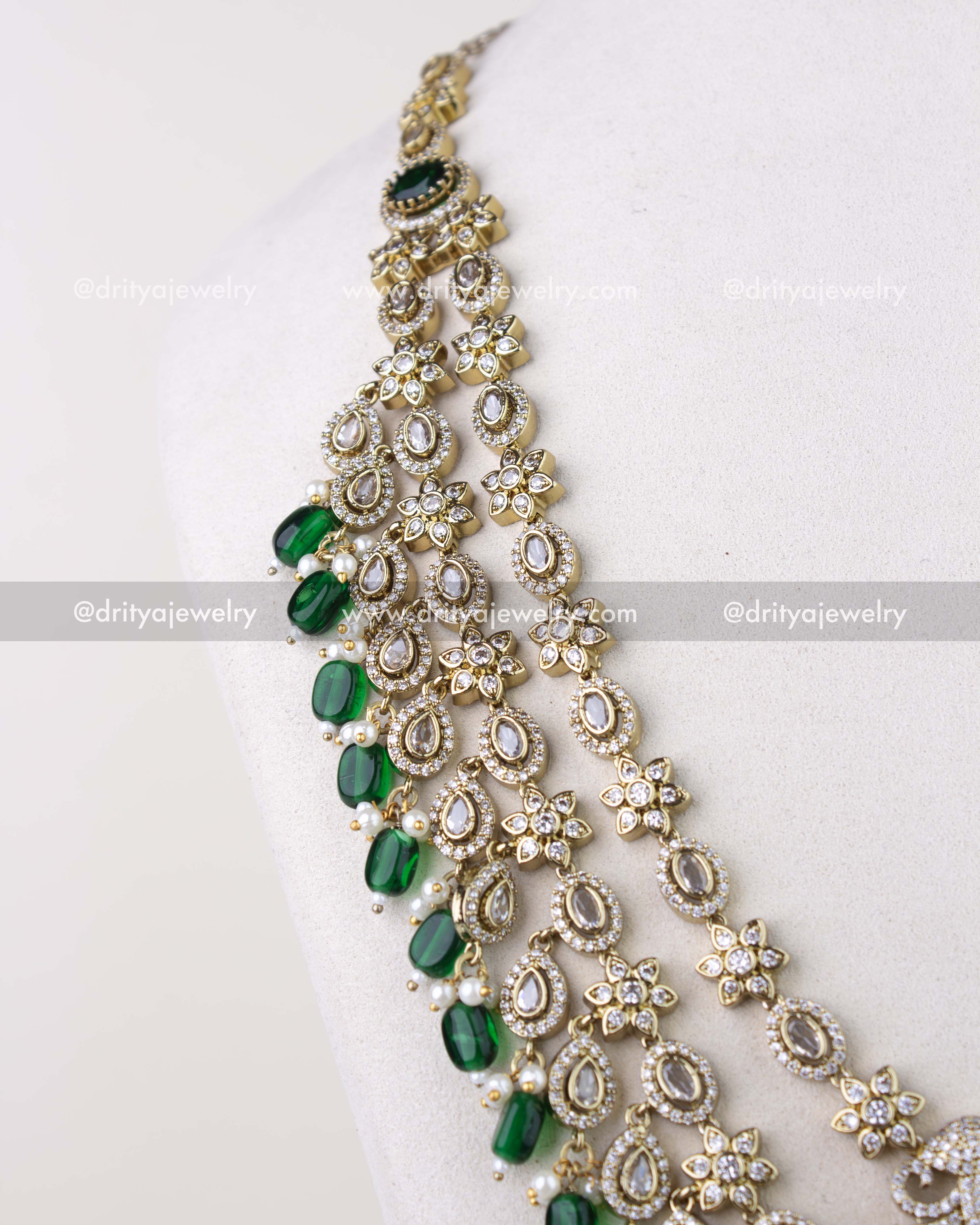 1309-GL angled view of multi-layer emerald bead drop necklace strands
