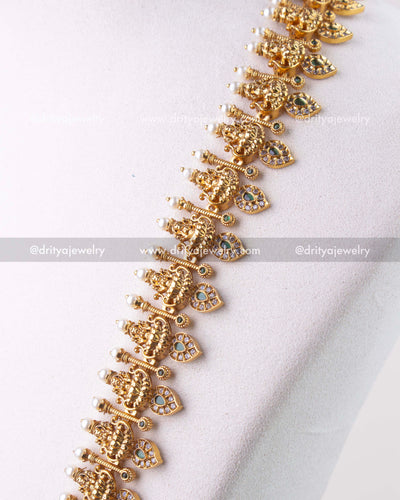 1279-G detailed view of layered god idol motifs with pearl-tipped accents on necklace