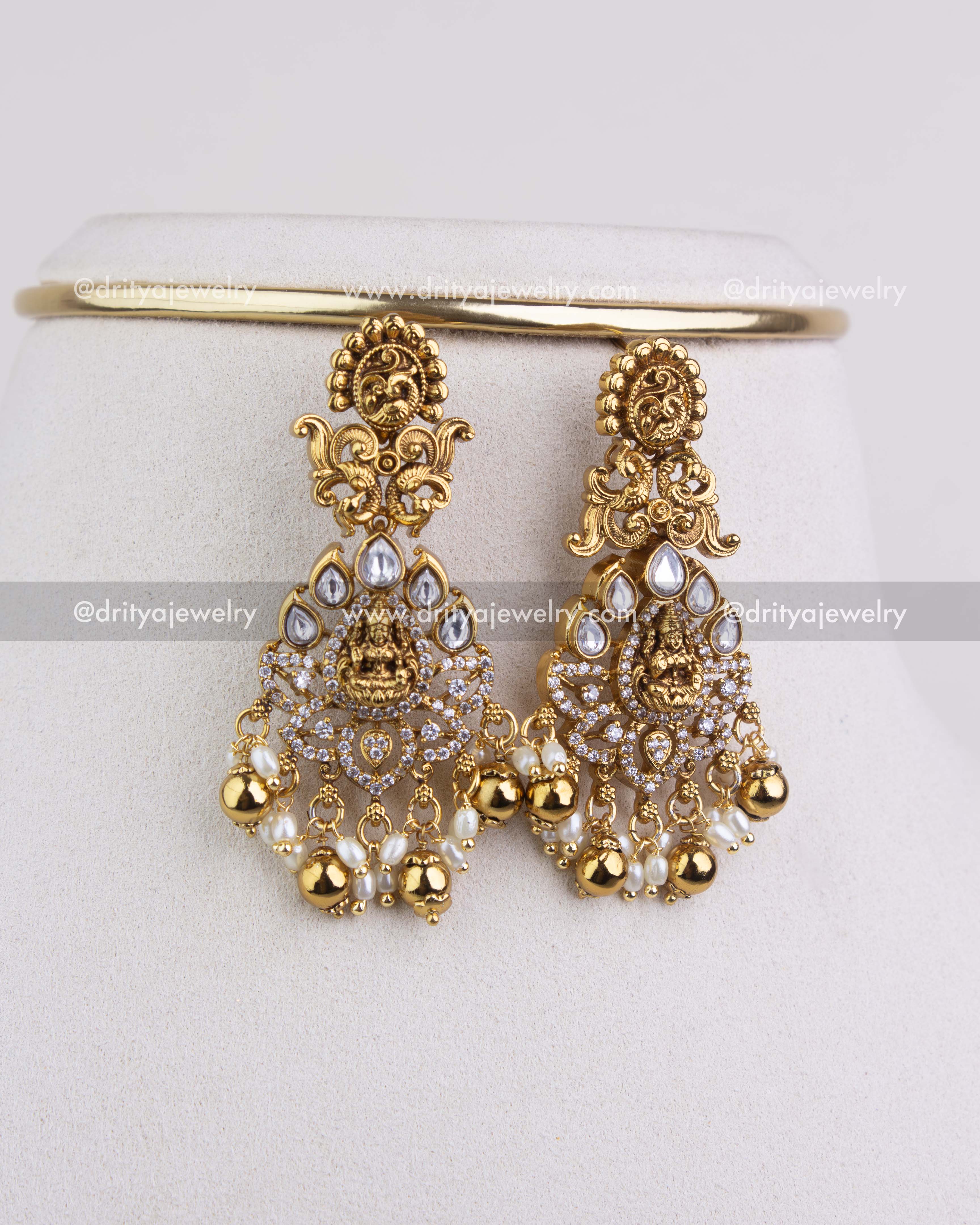 SKU 1251 close-up of matching temple god idol dangler earrings