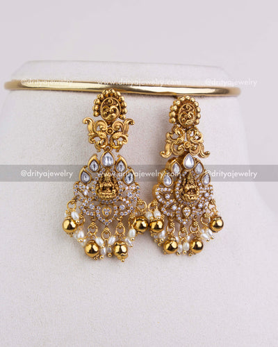 SKU 1251 close-up of matching temple god idol dangler earrings