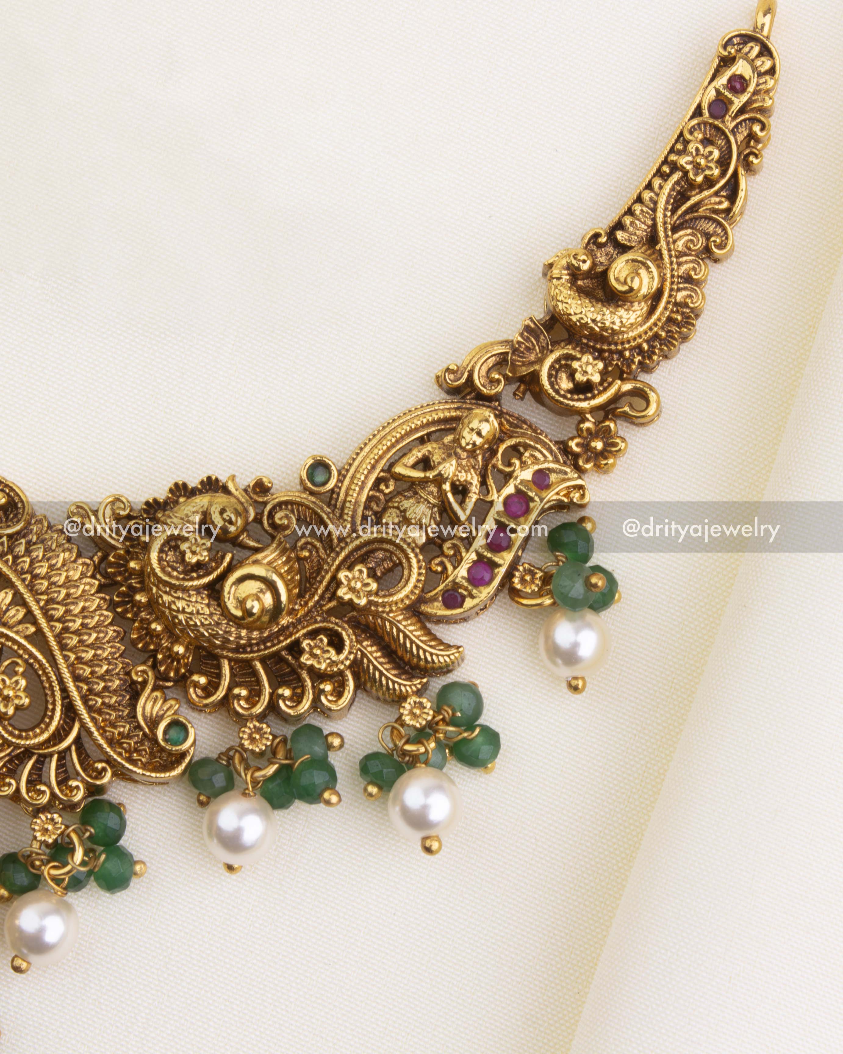 1203 - Side section of nakshi temple necklace with peacock motif and bead drops