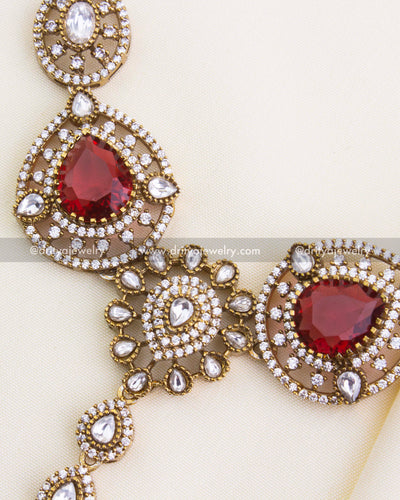 1112-R - Damini headpiece - close-up of central motifs with red stones and kundan work