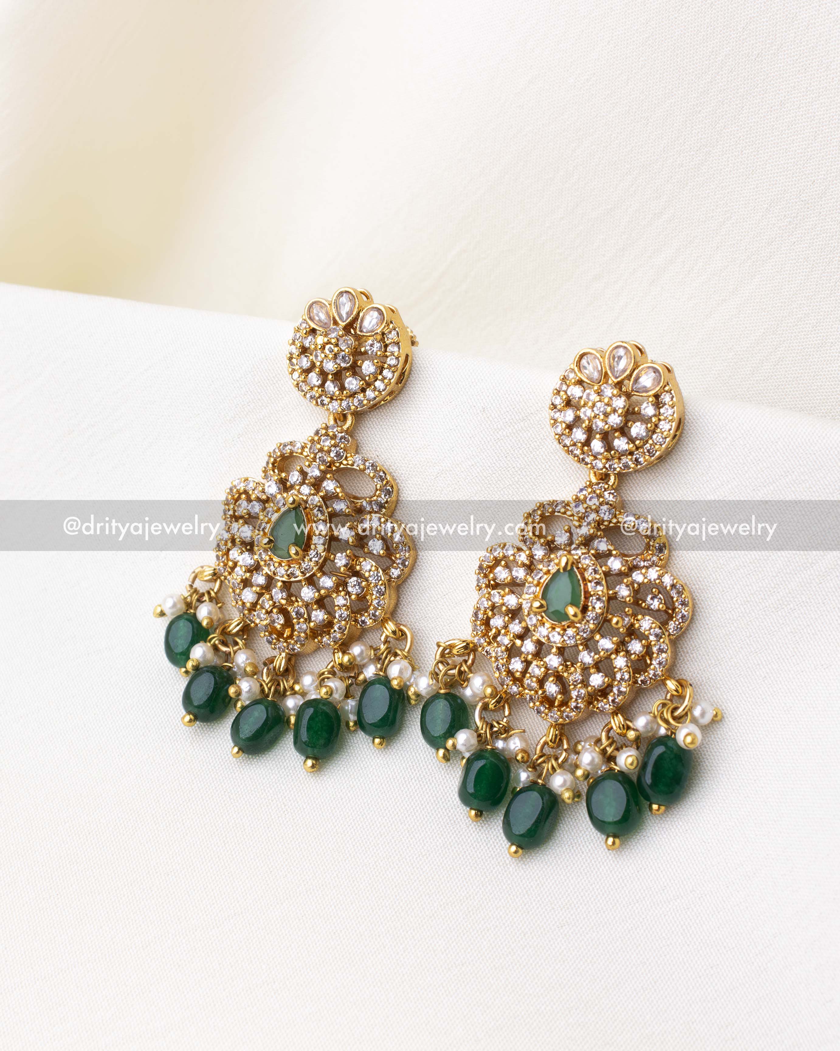 1269-G emerald green stone-studded gold replica earrings front view
