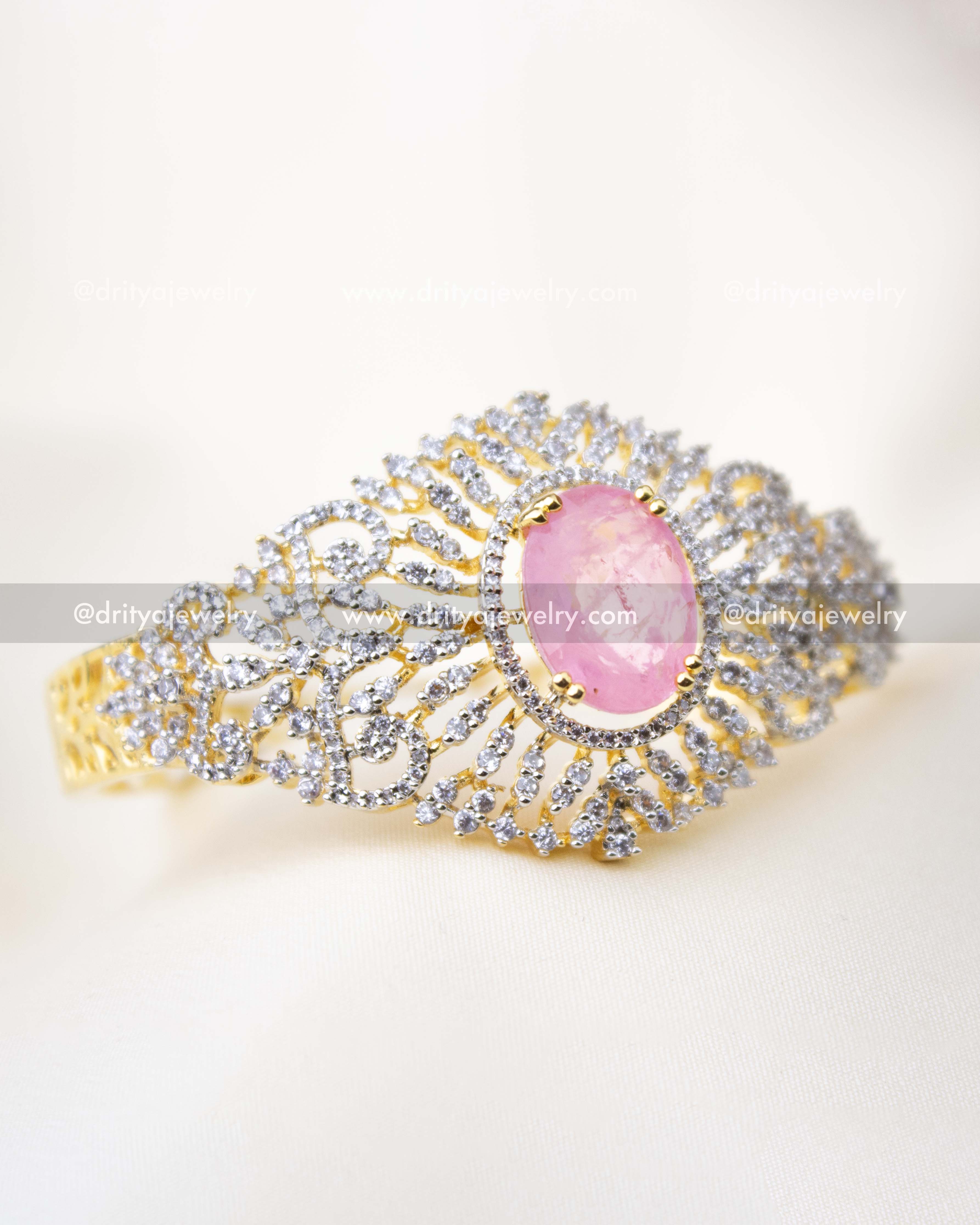 Top view of adjustable openable kada with oval pink stone and dual-tone finish, SKU 1295-BP