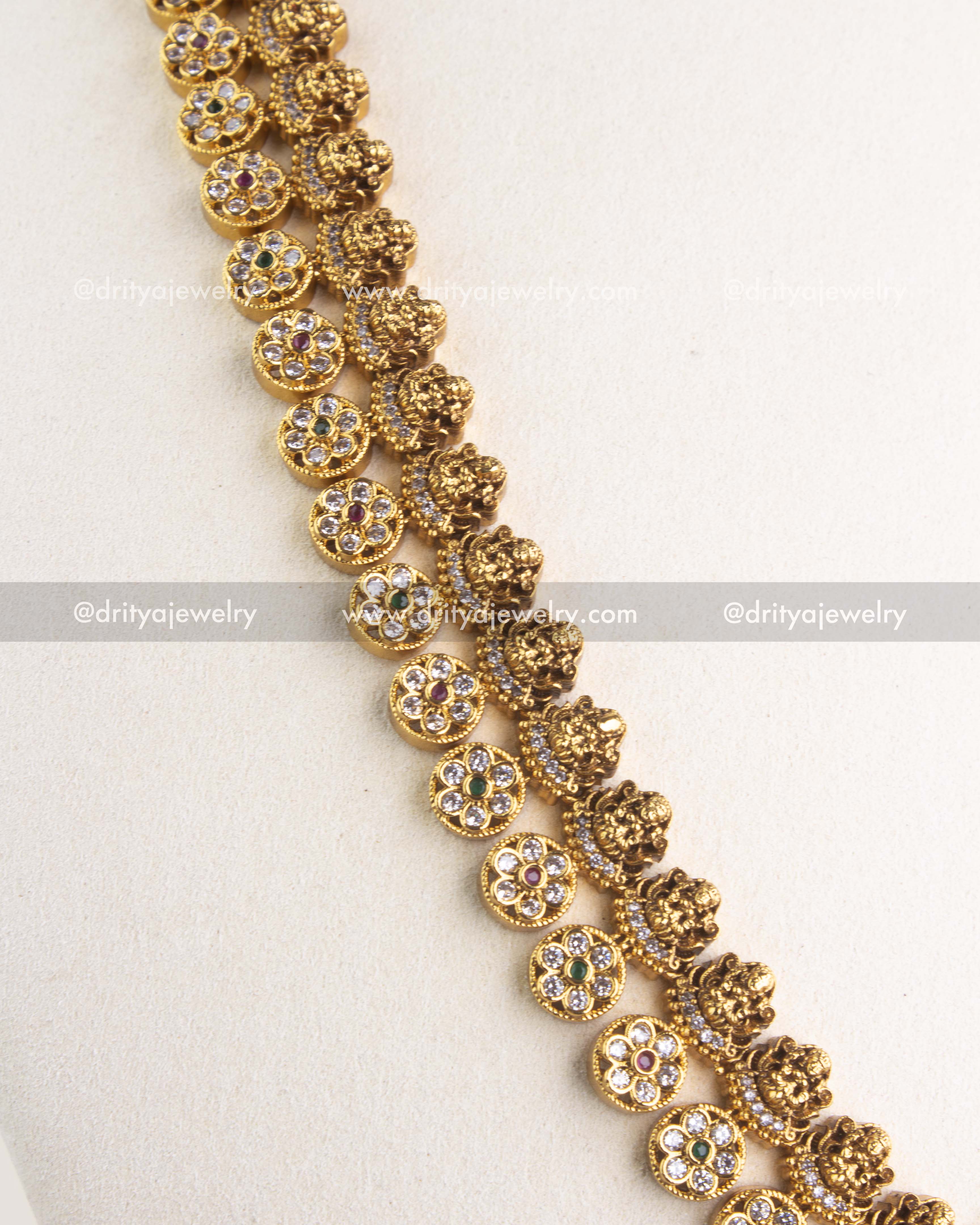 SKU 1186 Necklace Set angled view of kasulu patterned stone-studded chain