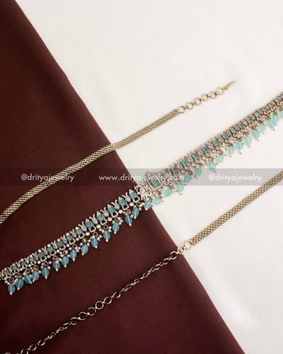 1130-MG hip chain full view showing mint stones, CZ detailing and adjustable waist chain laid flat