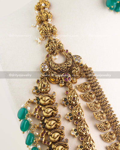 SKU 1164 Necklace Set close view of upper necklace sections with antique gold replica nakshi work.