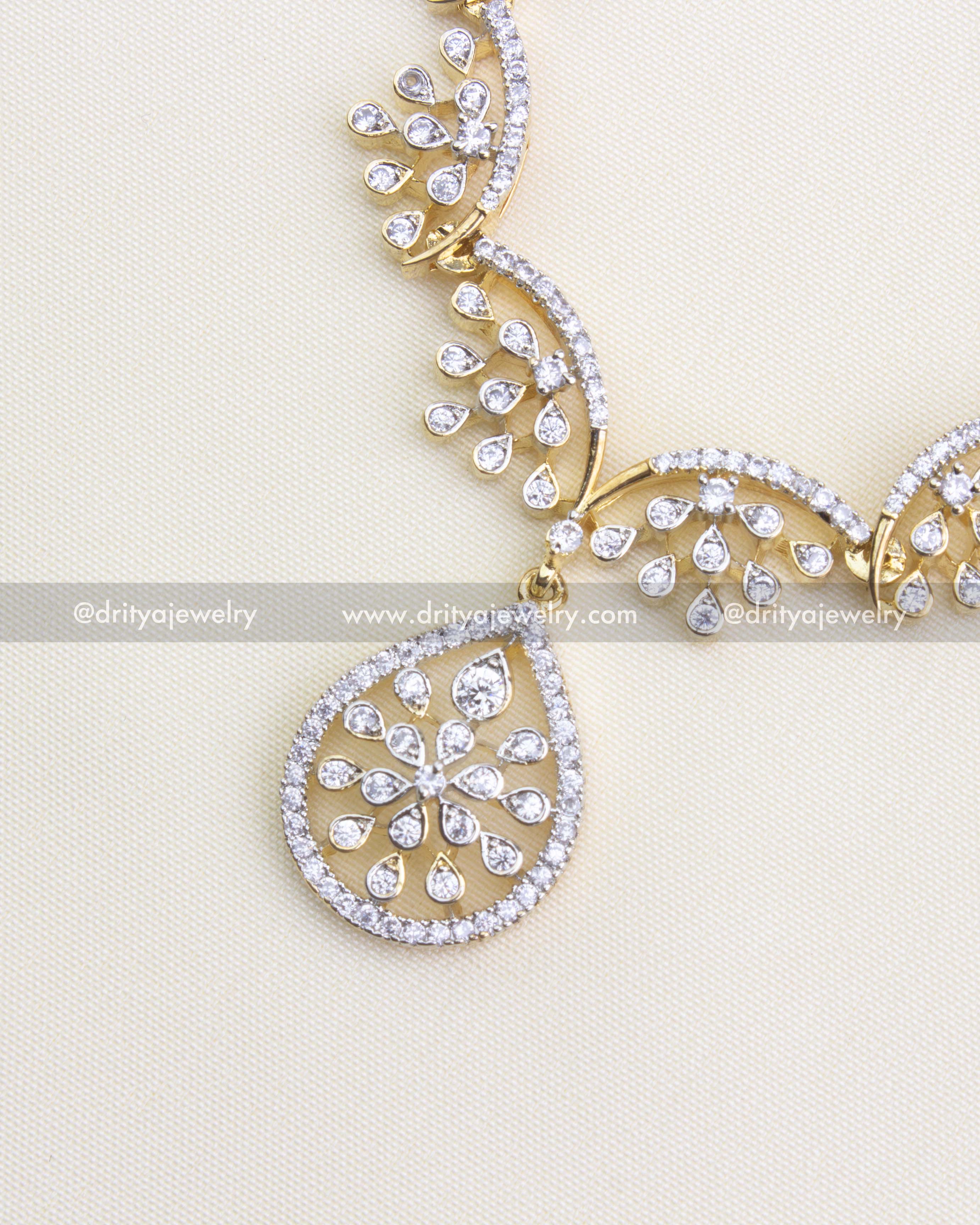 SKU 1151 Necklace Set - Detailed side view of CZ floral necklace pendant and links