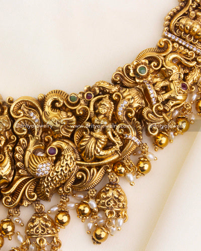 SKU 1167 detailed view of central necklace motifs with peacocks and figurines