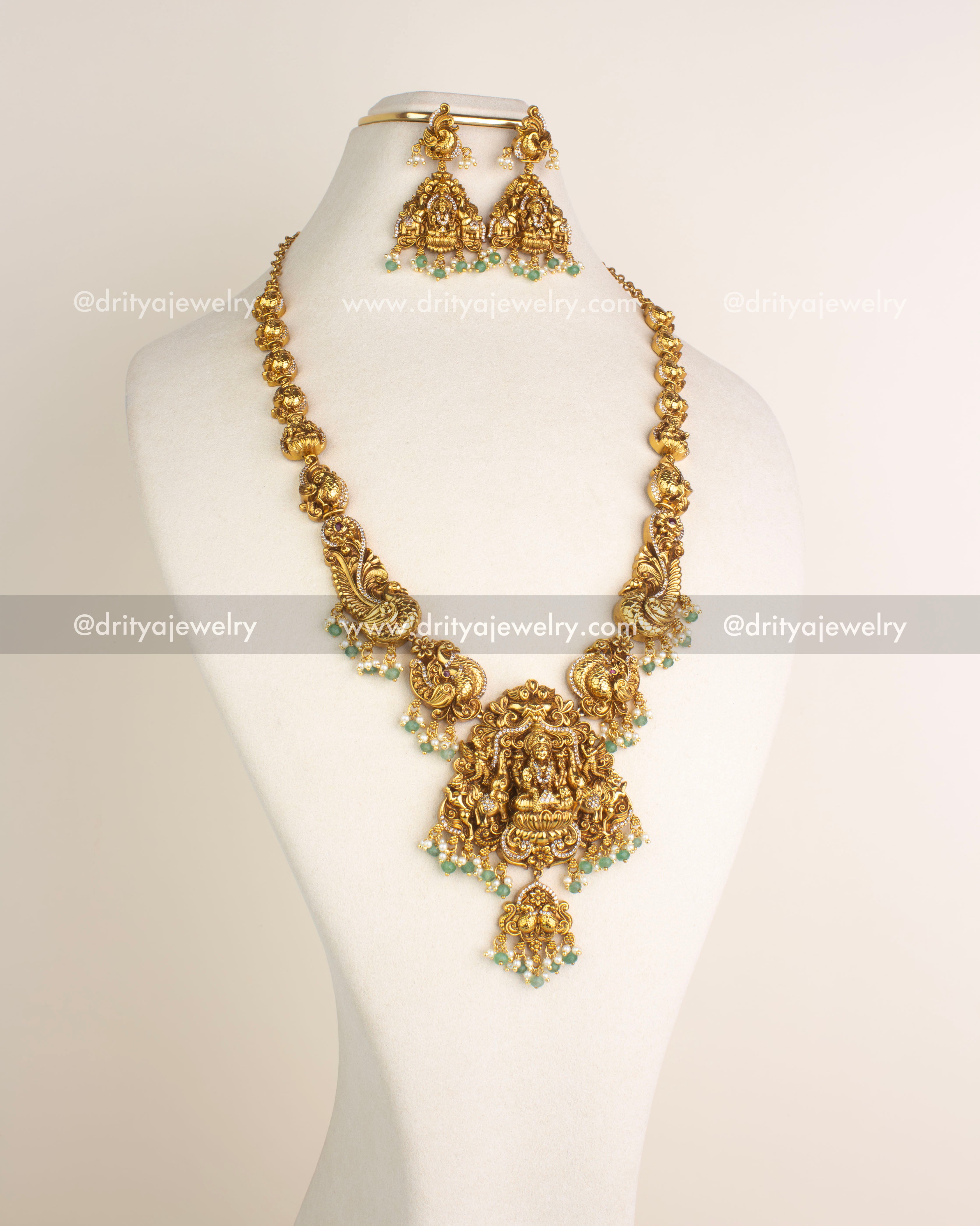 SKU 1178 Necklace Set full view of long god idol necklace with matching earrings on bust