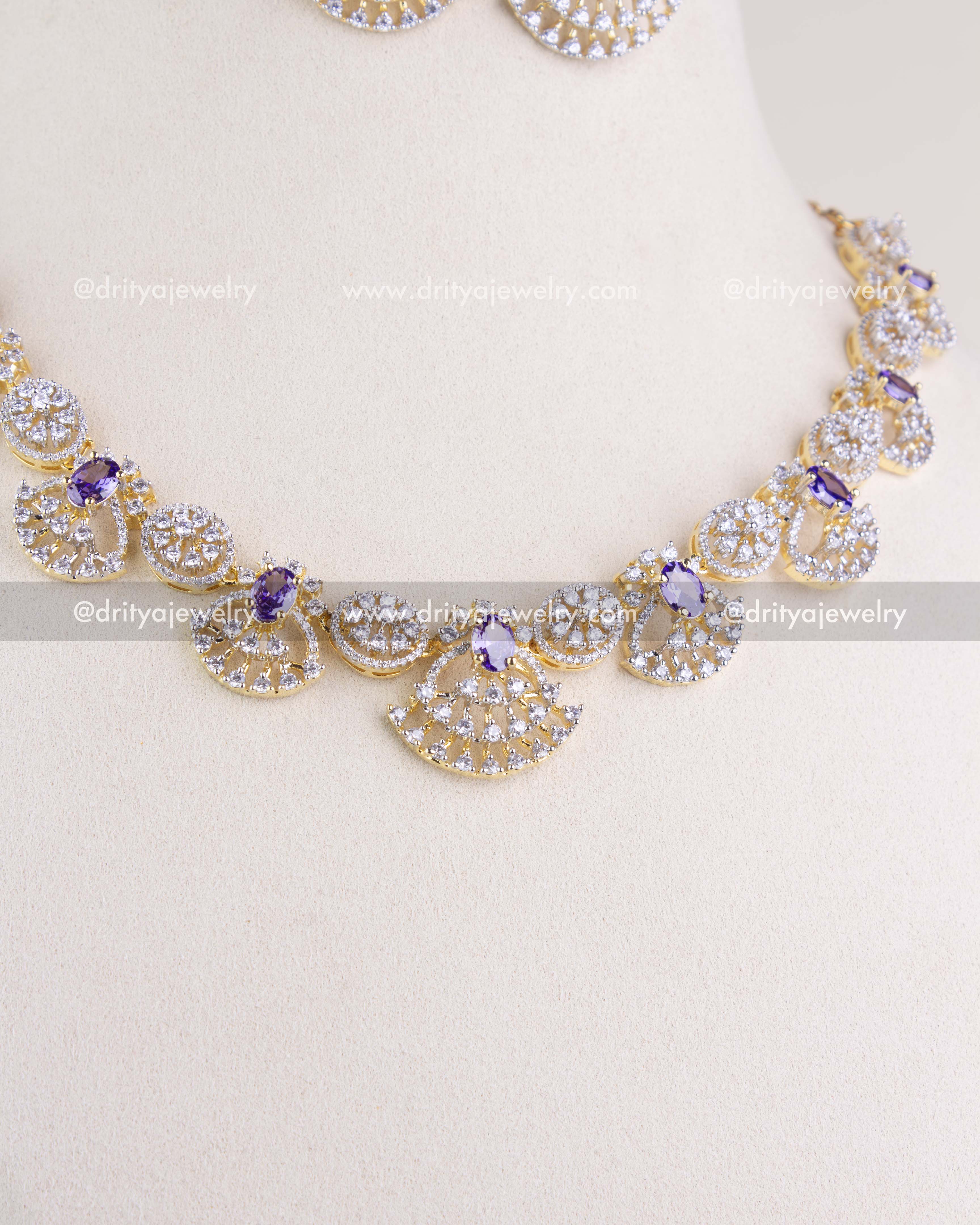 1211-PU front close-up of fan motif CZ and purple stone short necklace design