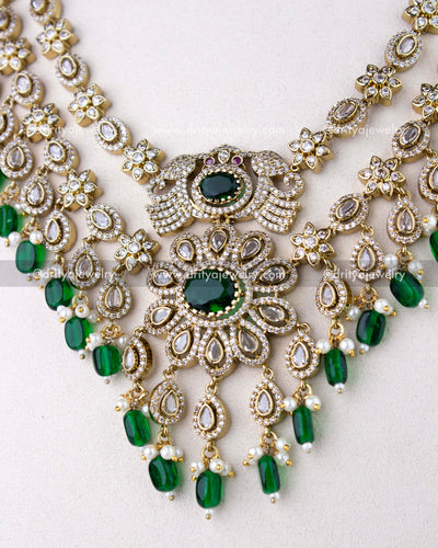 1309-GSET central pendant of layered necklace with emerald green stone and drops