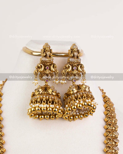 1253 - Premium big temple jhumka earrings with idol motif and layered bead drops