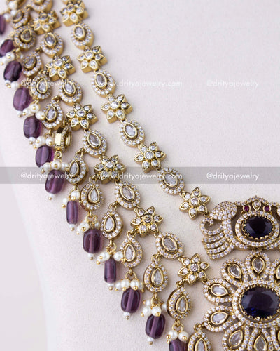1309-PUL Close-up of layered links with purple beads and pearl drops