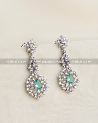 SKU 1136 Necklace Set - Close-up front view of long zircon and emerald-tone earrings