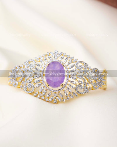 1295-PU front view of kada with crackled purple center stone and stone-studded halo