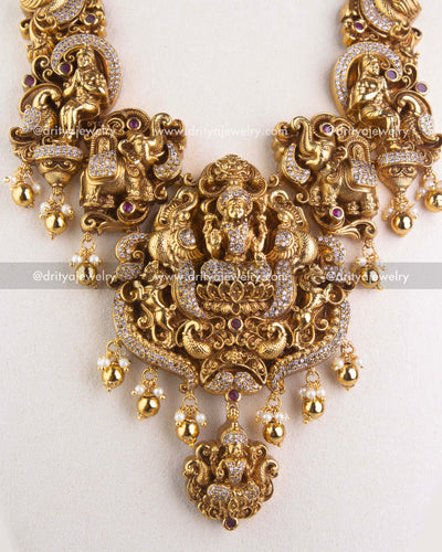 1253 - Close-up of god idol pendant with elephant and peacock motifs on temple necklace