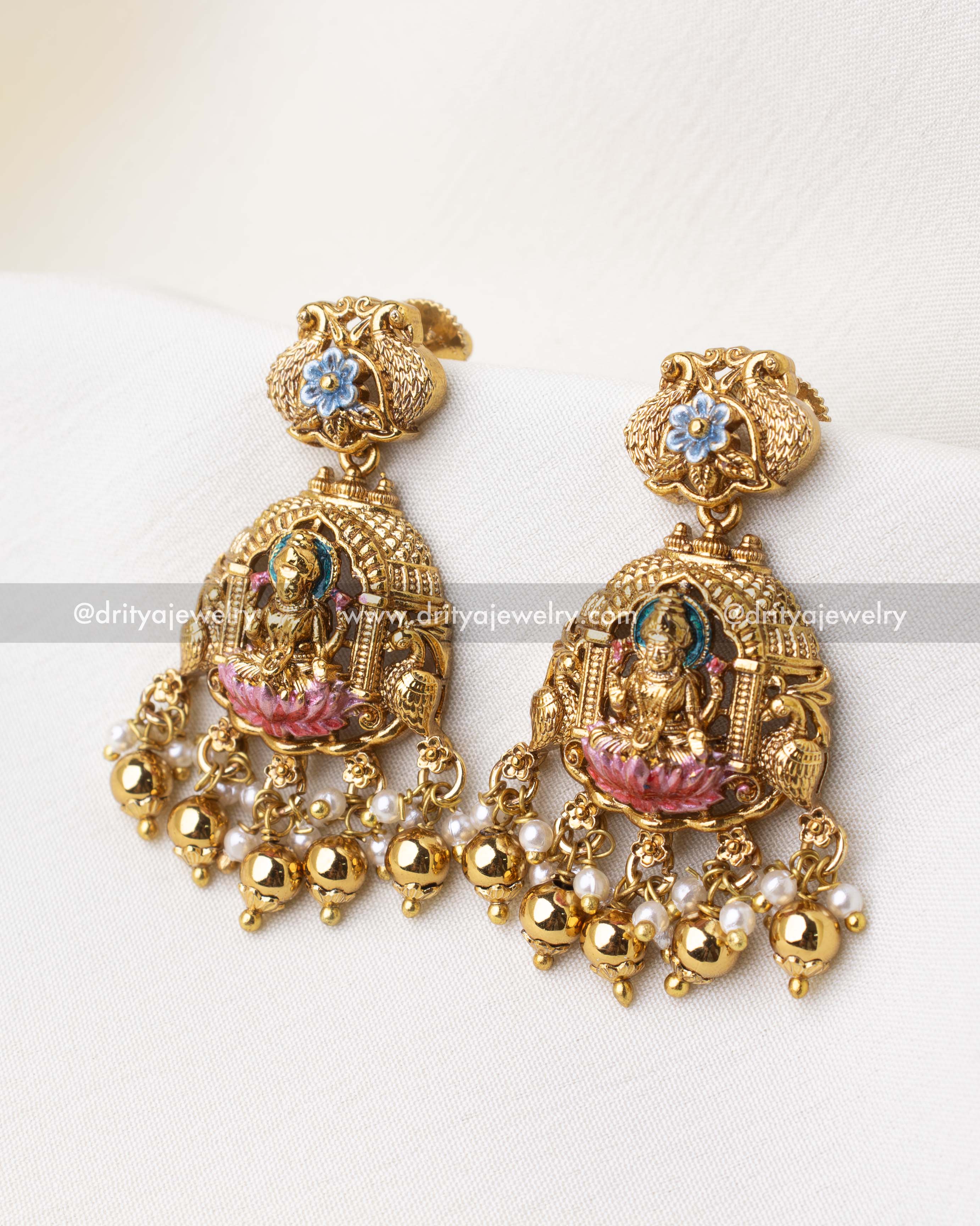 SKU 1262 - Lakshmi Devi meenakari jhumka earrings front view with pearl and gold bead drops