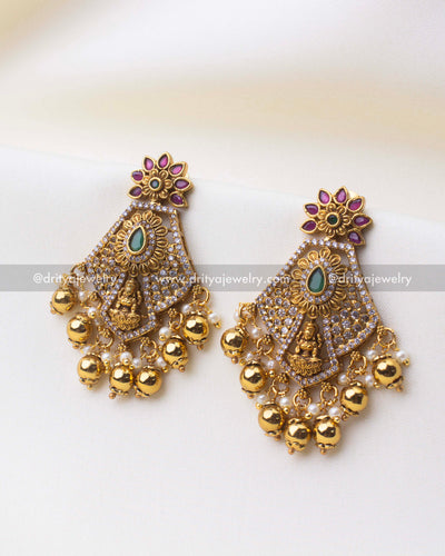 SKU 1252 - Temple dangler earrings front view with god idol motif and ghungroo drops