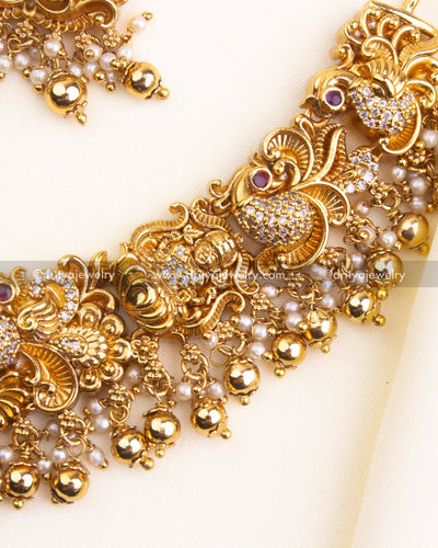 700-GGO - Necklace Set - Side close-up of necklace edge with nakshi work and bead tassels