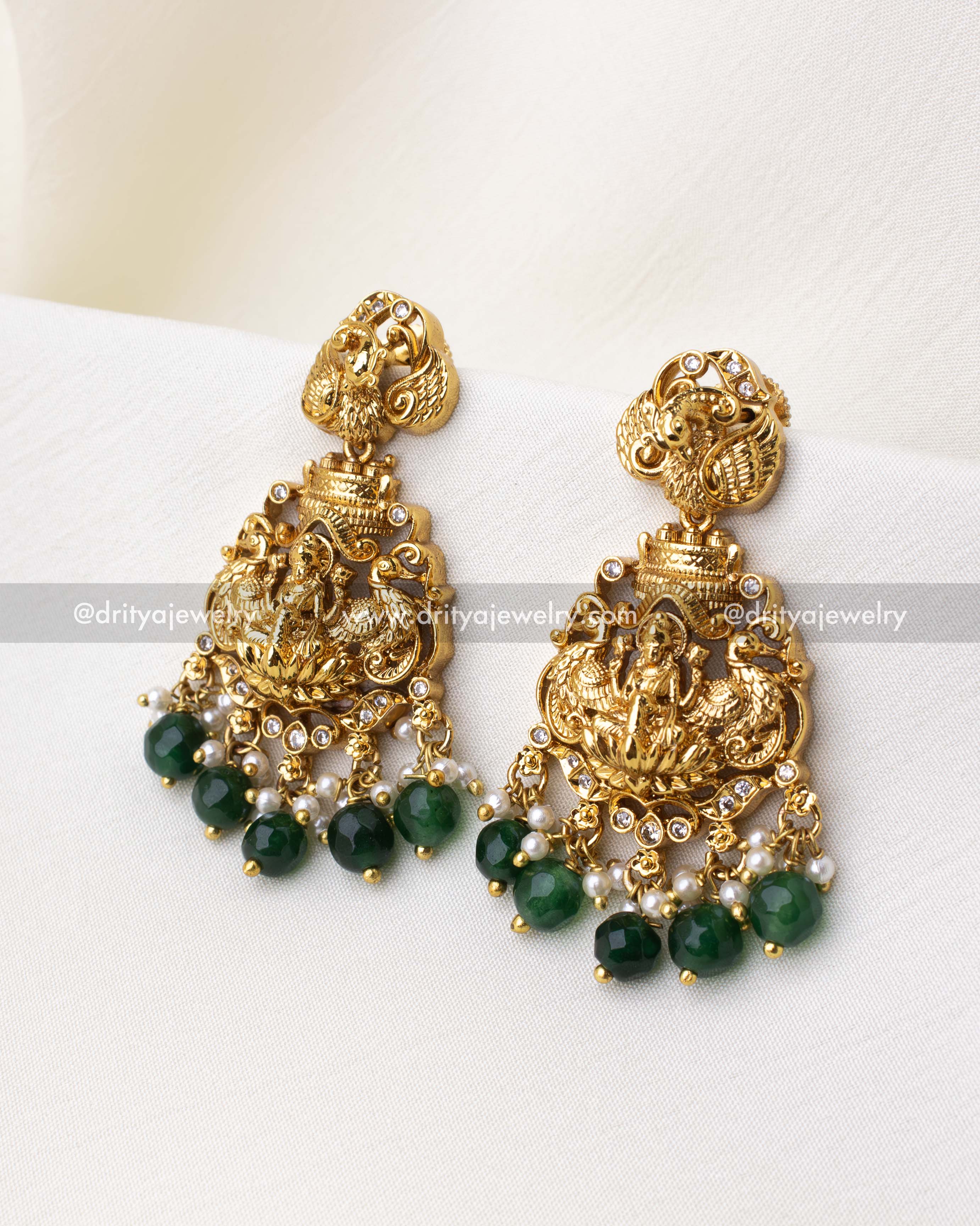 1263-G temple style earrings with god idol motif and emerald green bead drops