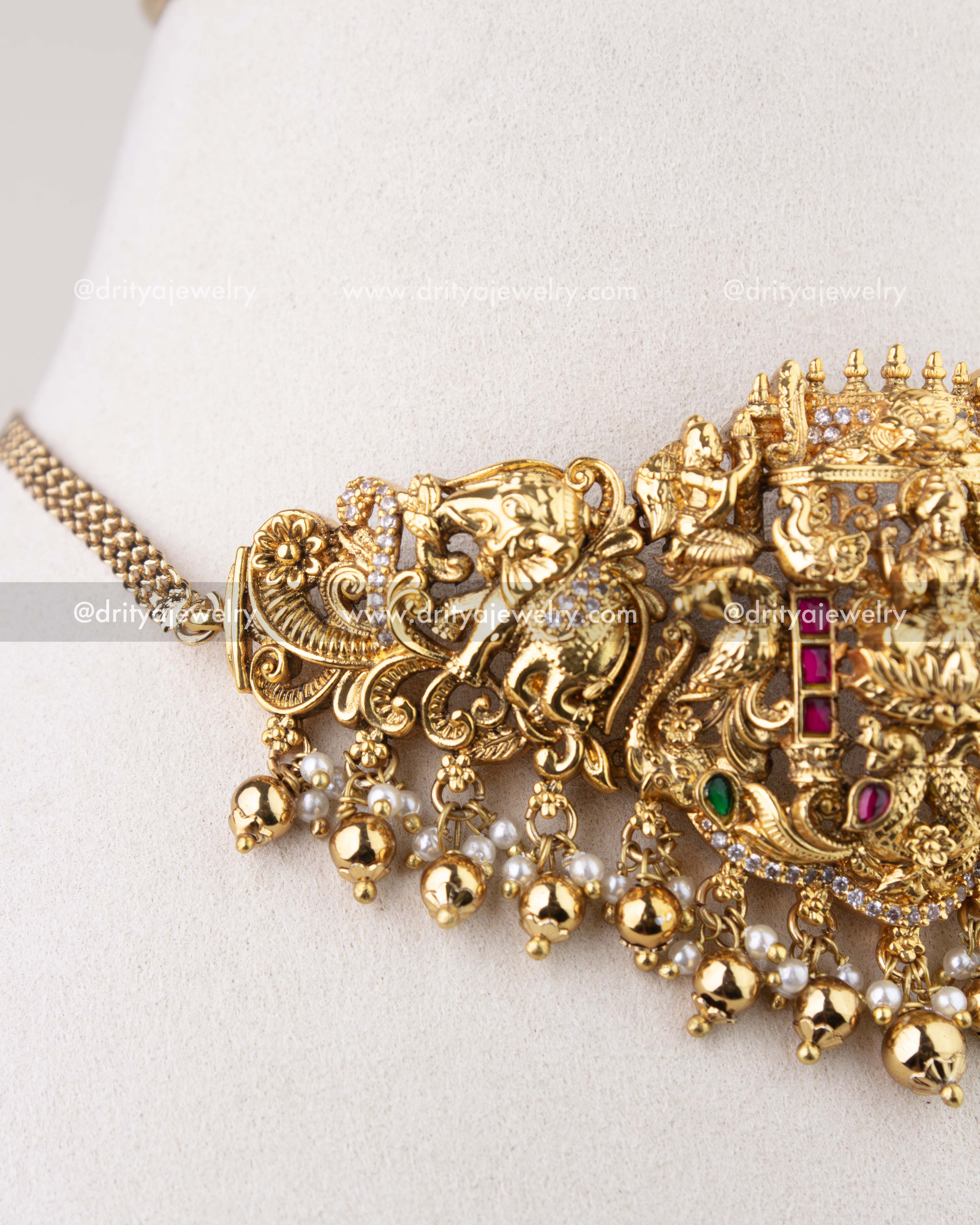 1282 - Detailed view of choker side panel with elephant and floral nakshi work and bead drops
