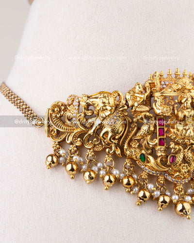 1282 - Detailed view of choker side panel with elephant and floral nakshi work and bead drops
