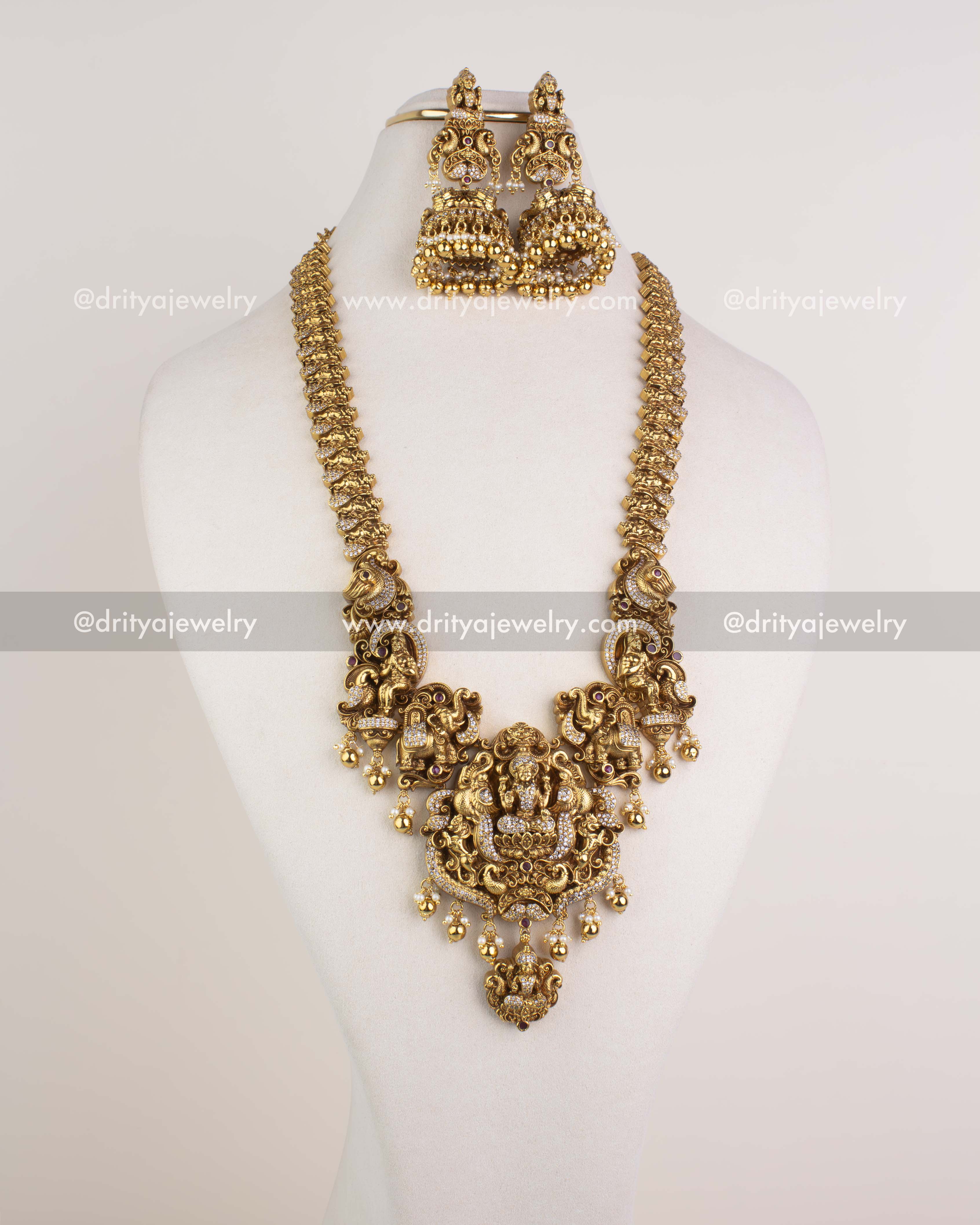 1253 - Temple long necklace set with god idol pendant and big jhumka earrings front view