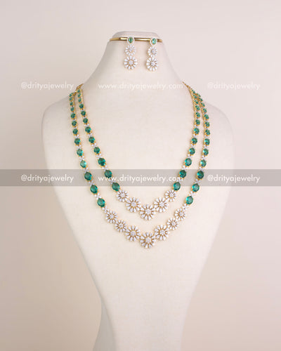 1215-RE layered emerald and CZ bridal necklace set with matching dangler earrings displayed on bust