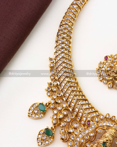 1223-G side view of CZ-studded kanti necklace band with green drops